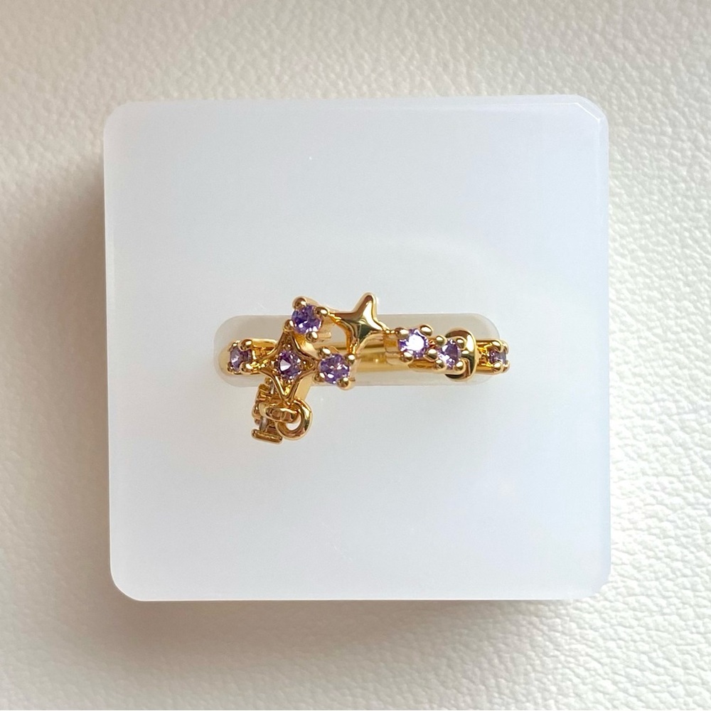 Gold Ring with Purple Gemstones